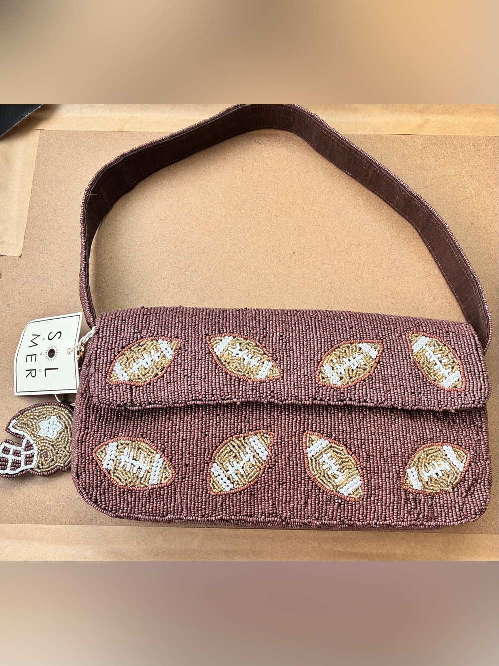 🏈SOL AND MER football motif fully beaded shoulder bag with charm NWT viral bag!